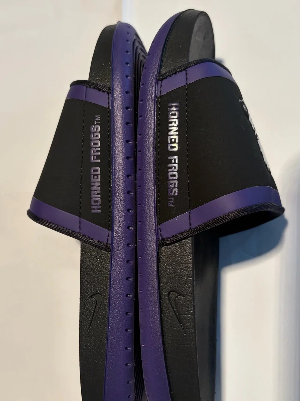 Nike Black Slide Sandals with Purple Trim and White Monster Graphic